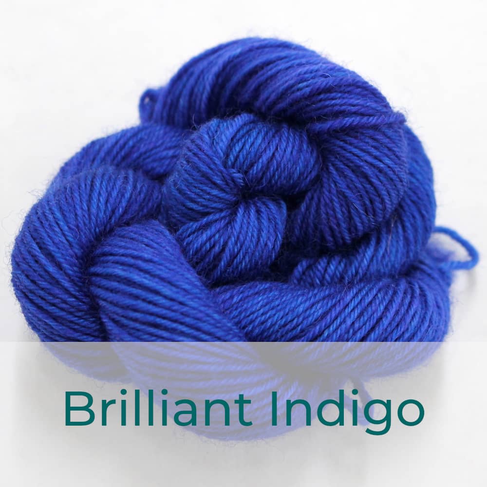 BFL 4 Ply mini skein in Brilliant Indigo colourway. It is bright blue.