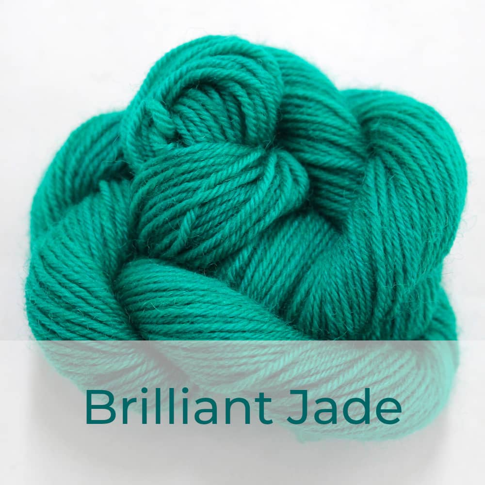 BFL 4 Ply mini skein in Brilliant Jade colourway. It is bright jade-green.