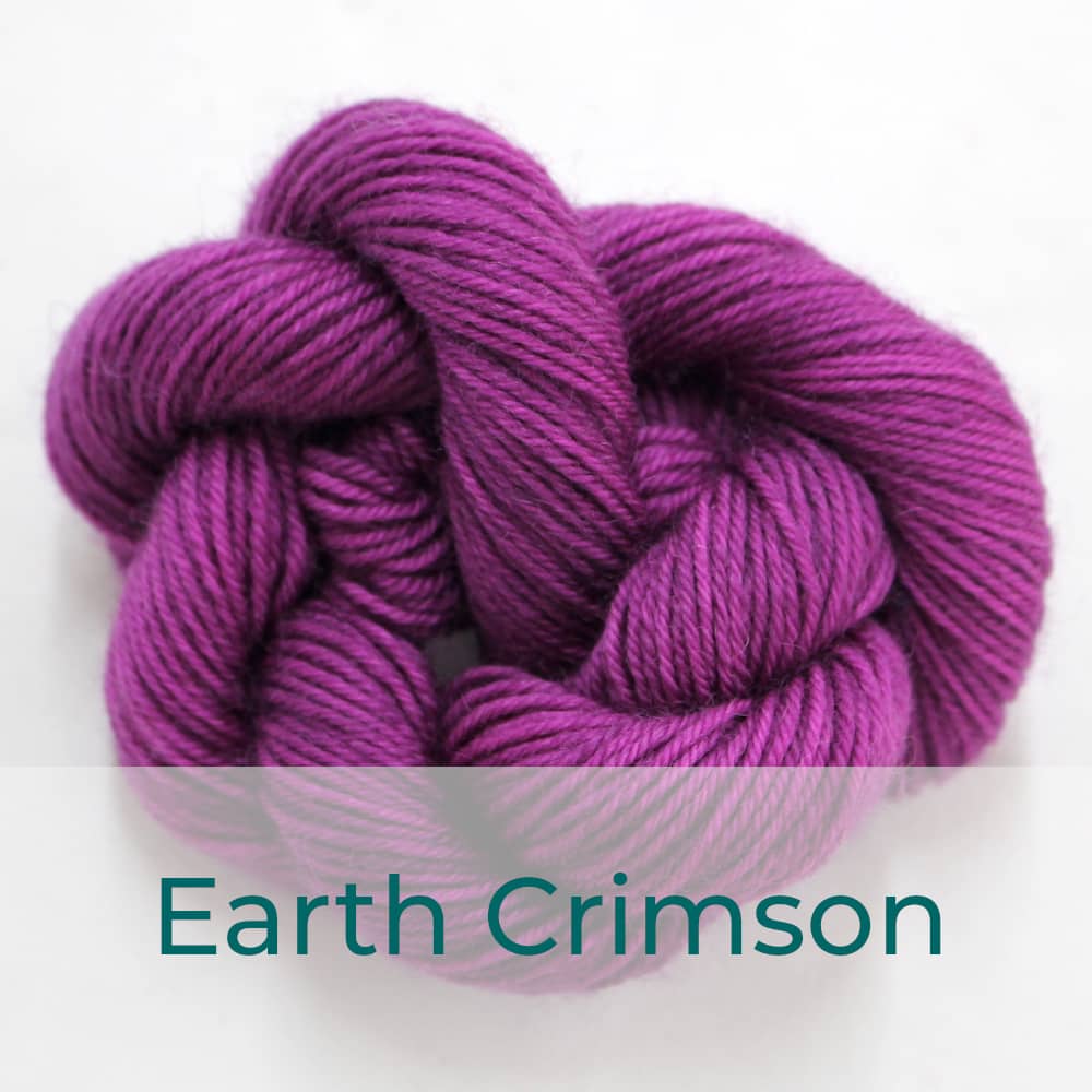BFL 4 Ply mini skein in Earth Crimson colourway. It is a dusky pink / purple.