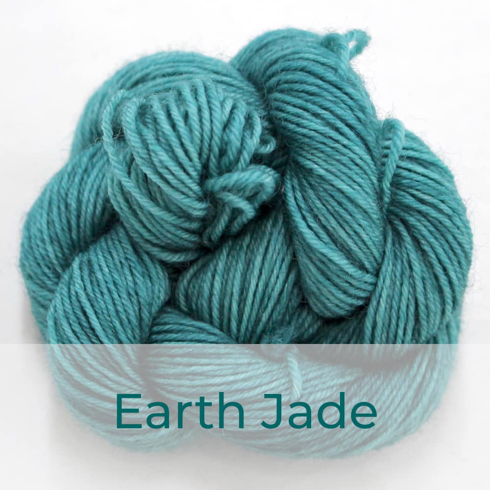 BFL 4 Ply mini skein in the Earth Jade colourway. It is soft sea green.