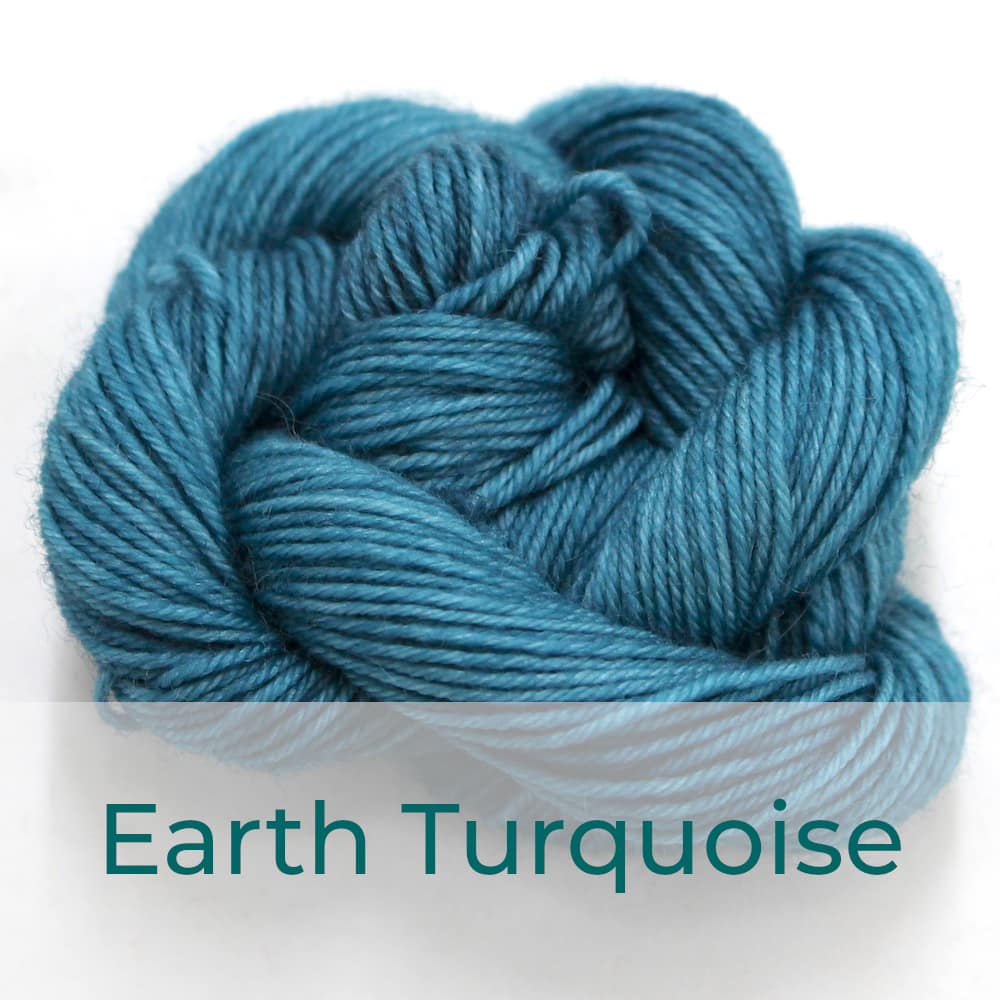BFL 4 Ply mini skein in the Earth Turquoise colourway. It is a soft muted turquoise colour.
