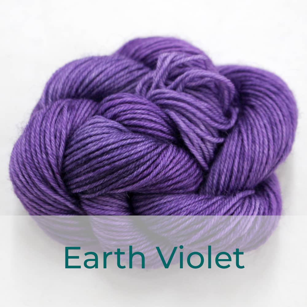 BFL 4 Ply mini skein in the Earth Violet colourway. It is dusky violet purple.