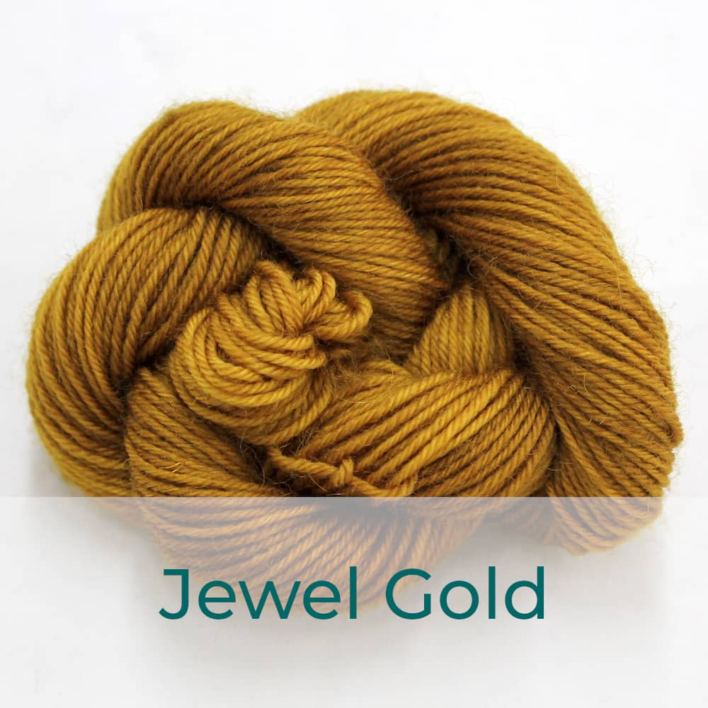 BFL 4 Ply mini skein in the Jewel Gold colourway. It is a mustard colour.