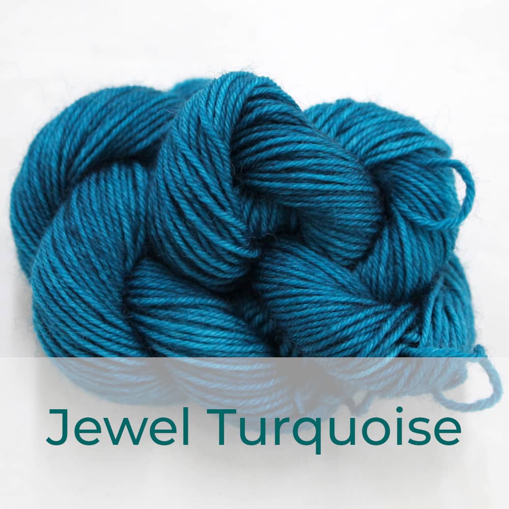 BFL 4 Ply mini skein in Jewel Turquoise colourway. It is rich turquoise.