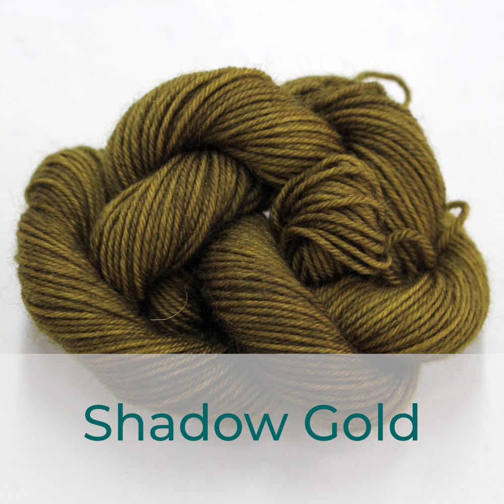 BFL 4 Ply mini skein in the Shadow Gold colourway. It is dark green-brown.