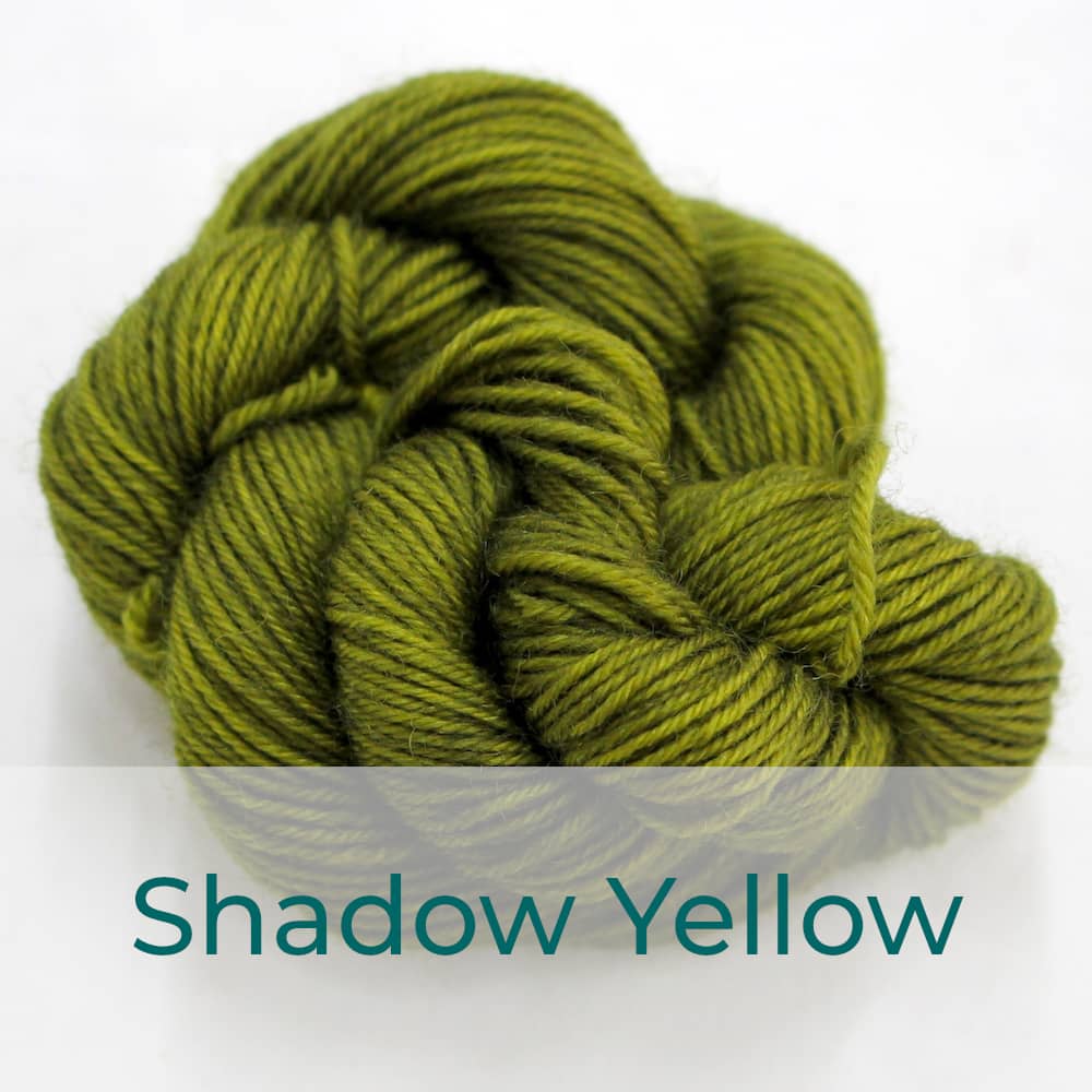 BFL 4 Ply mini skein in Shadow Yellow colourway. It is dark green-brown.