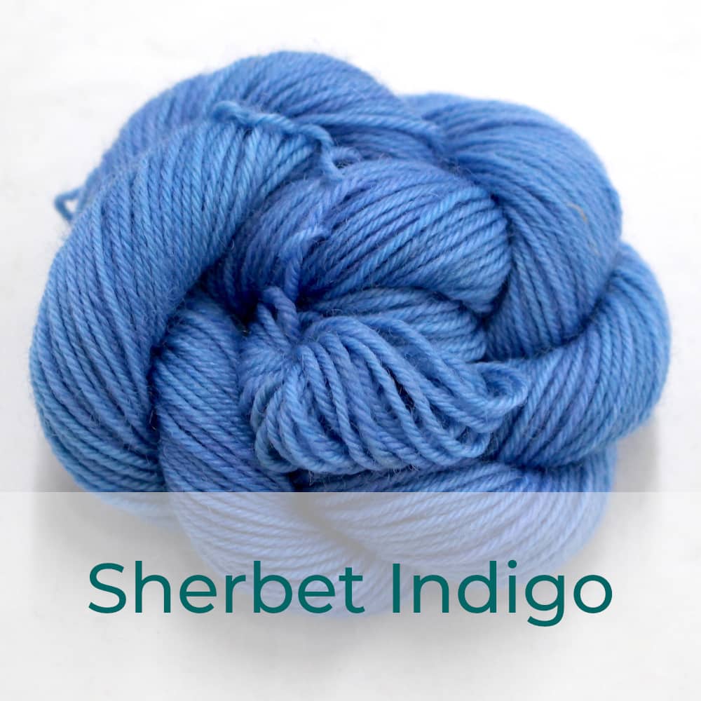 BFL 4 Ply mini skein in Sherbet Indigo colourway. It is light blue.