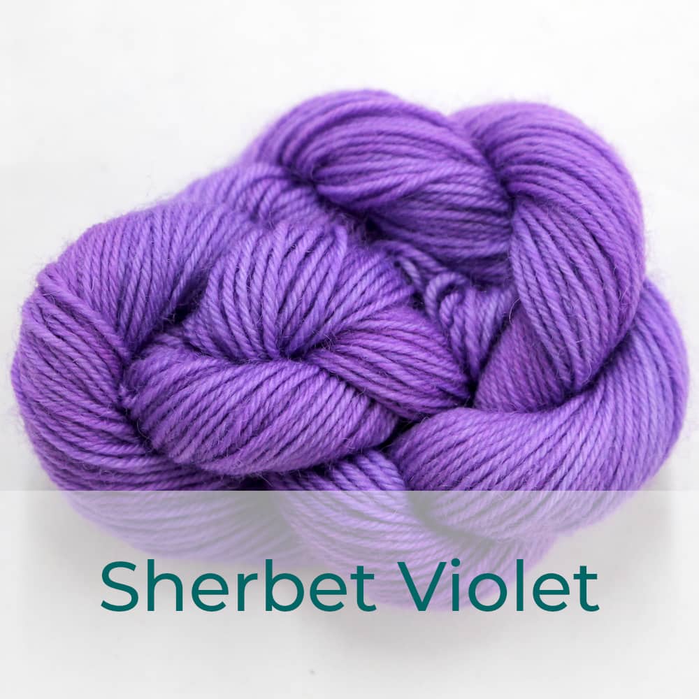 BFL 4 Ply mini skein in the Sherbet Violet colourway. It is light bright purple.