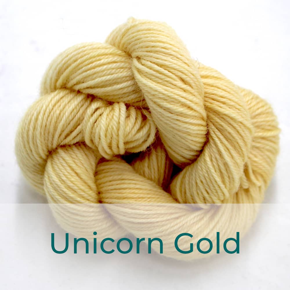 BFL 4 Ply mini skein in the Unicorn Gold colourway. It is a light buttery yellow.