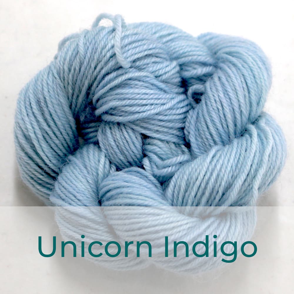 BFL 4 Ply mini skein in the Unicorn Indigo colourway. It is very light blue.