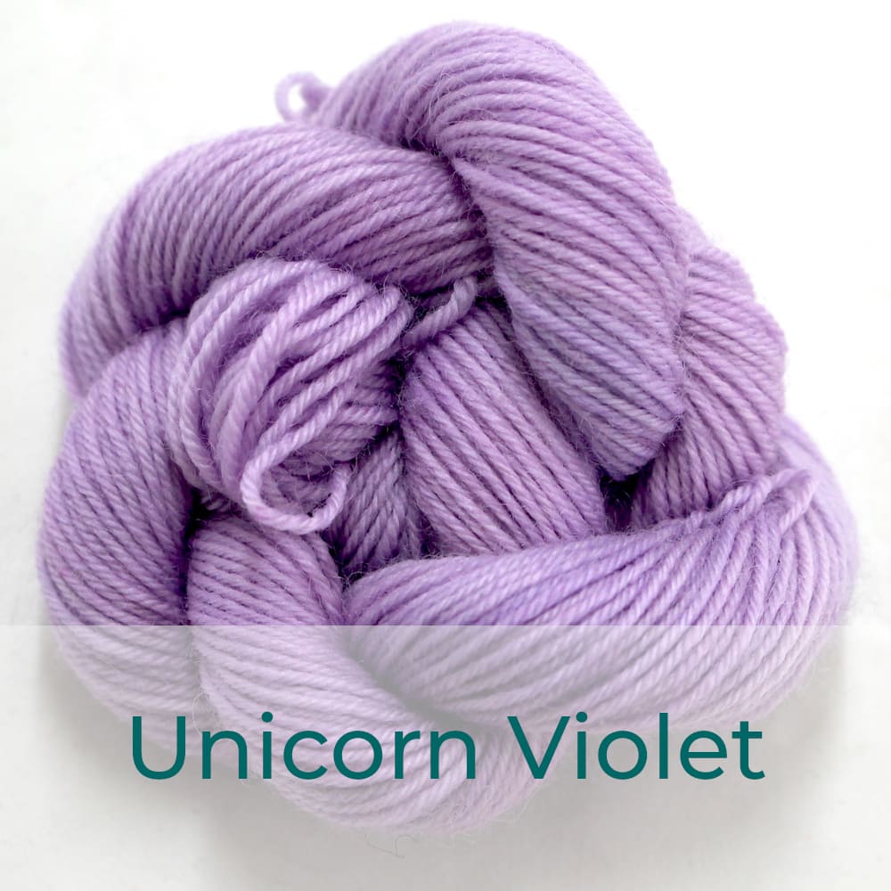 BFL 4 Ply mini skein in the Unicorn Violet colourway. It is very light purple.