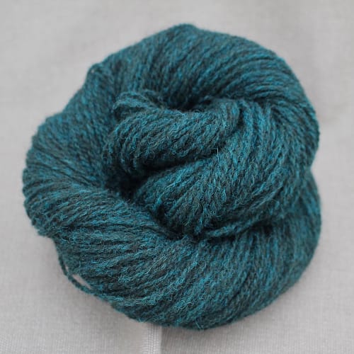 A skein of Severn 4 Ply in a dark moody teal