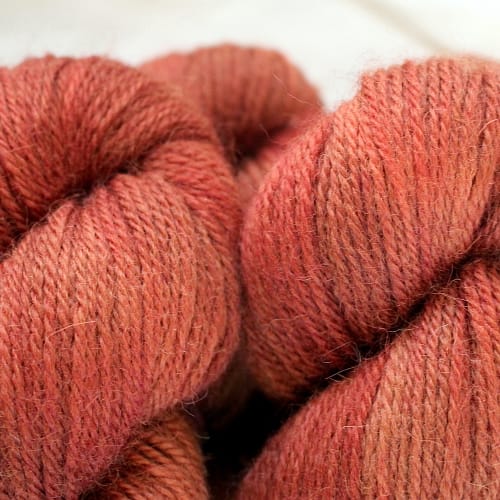 Close up of skeins of warm chestnut brown yarn
