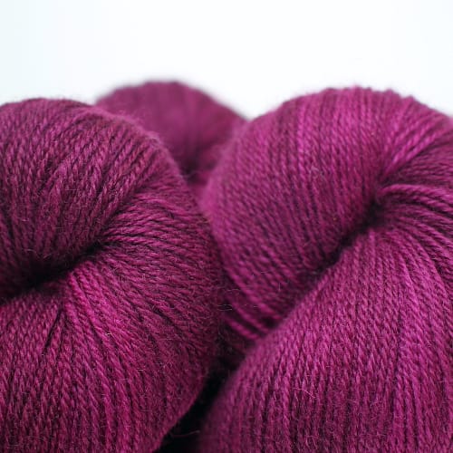 Skeins of Zwergpflaume, a deep plum colour